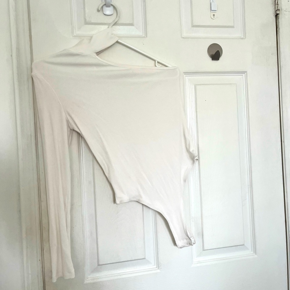 Beautiful one sleeve white bodysuit